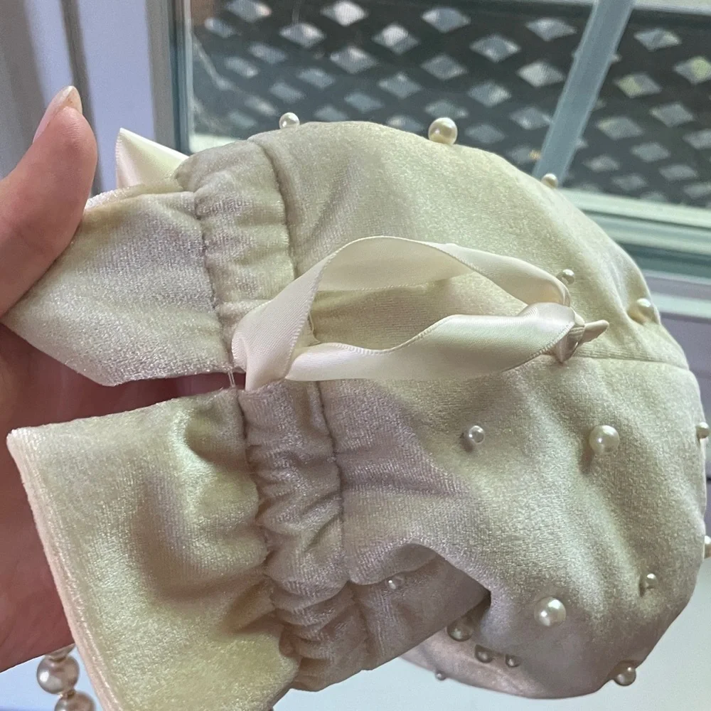 1234.‎ D’margeaux Elegant Cream Drawstring Bag with Pearl Accents